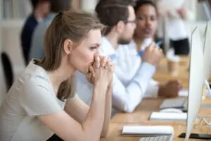 woman with anxiety trying to get through her work day