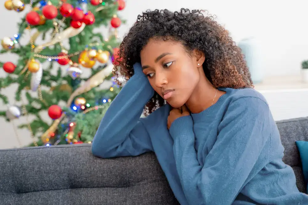 Depressed woman on christmas holiday