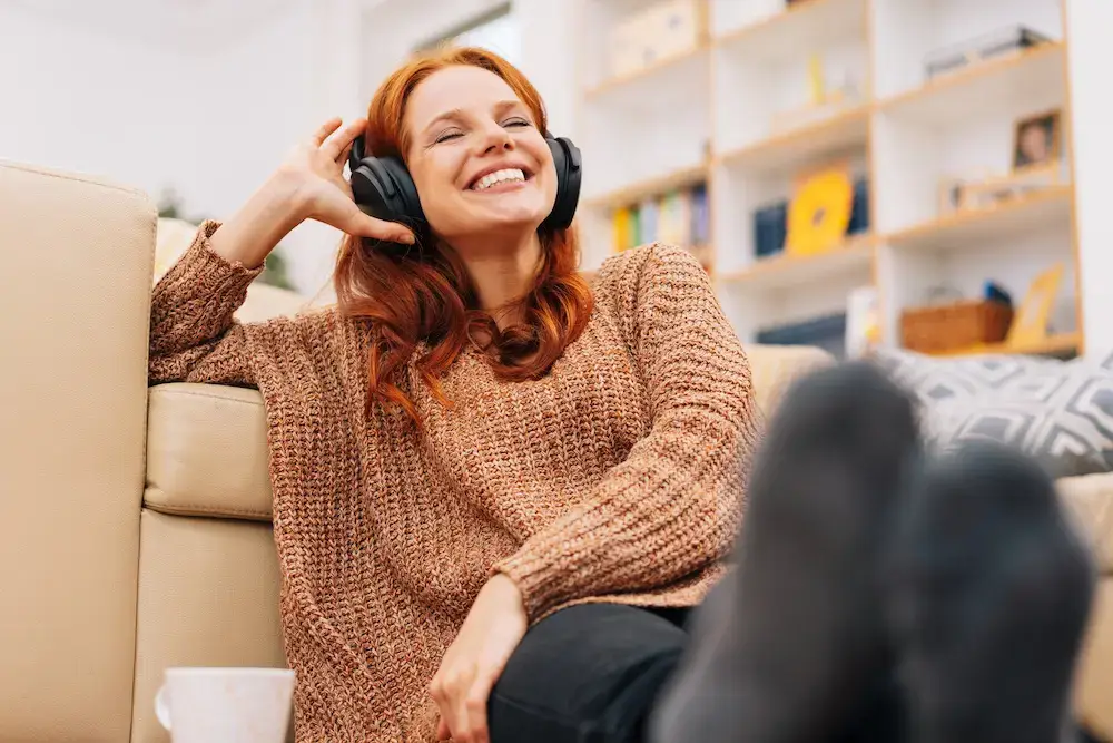 woman with a mental health disorder listening to a podcast