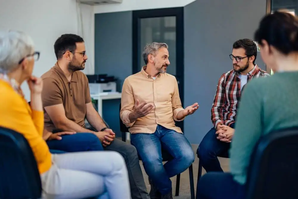 A group discussing mental health topics.