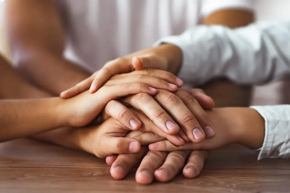 A strong family showing support to a family member in need.