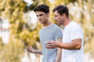 A father talking to his son about the newfound responsabilities of becoming an adult and moving away from home.