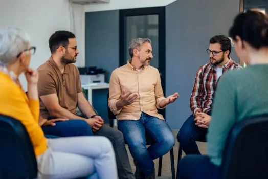 A group discussing mental health topics.